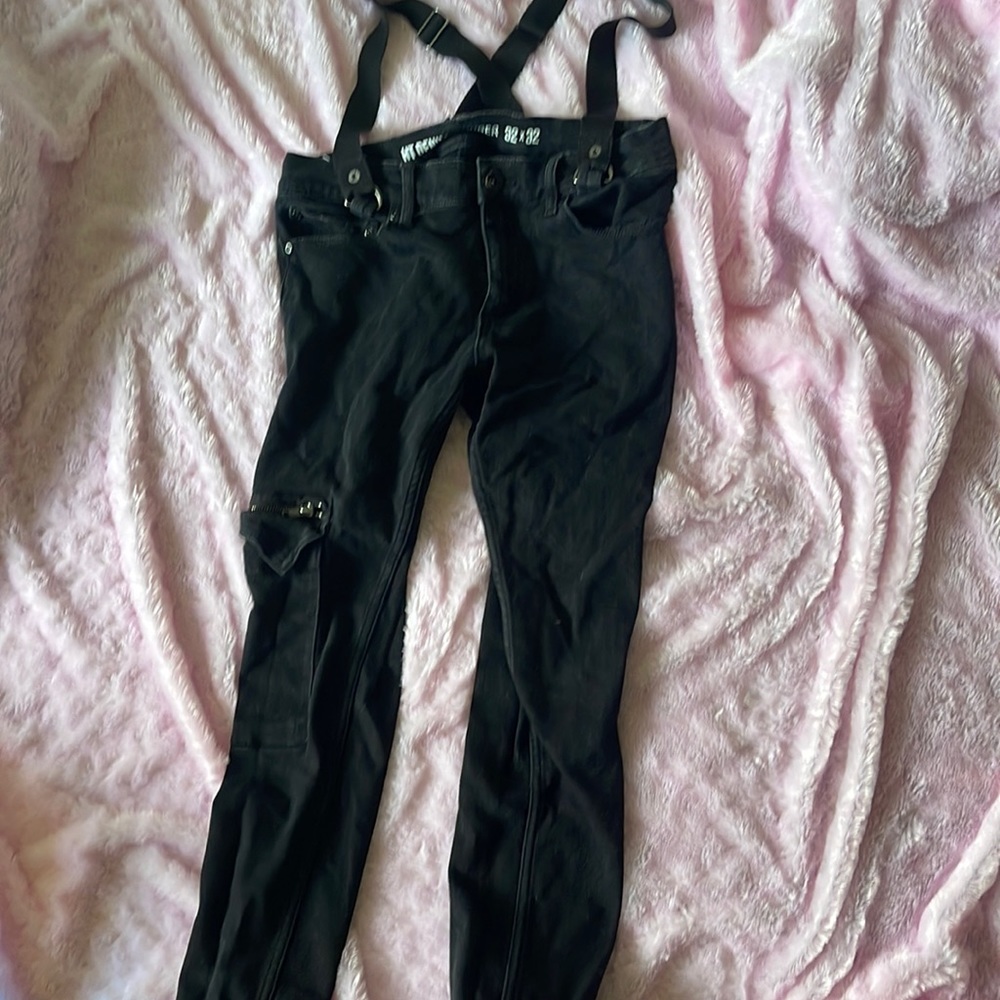 Denim skinny jeans with suspenders attached